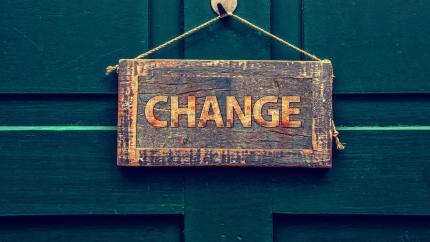 A text board with the word "change"