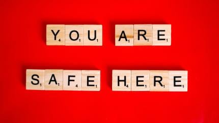 A red background with the text "You Are Safe Here"