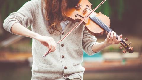 photo courtesy of pexels - https://www.pexels.com/photo/woman-in-gray-cardigan-playing-a-violin-during-daytime-111287/
