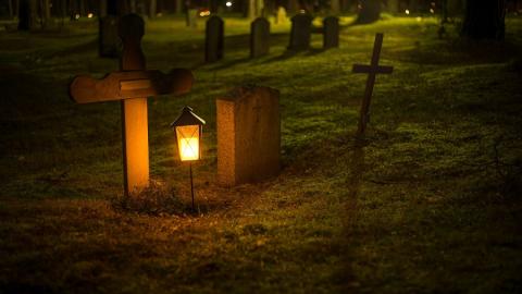https://www.pexels.com/photo/selective-focus-photo-of-cemetery-lantern-720730/