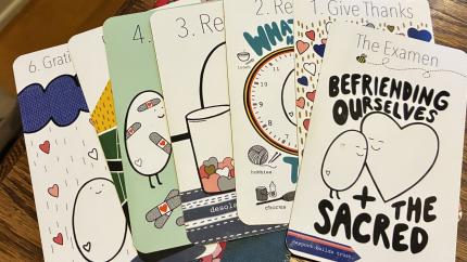 A set of handmade Examen cards sit on a tabletop. Courtesy of Mavis Moon.