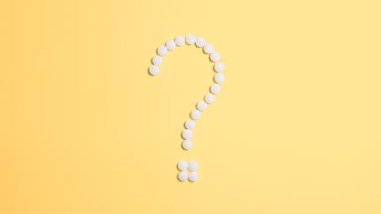 A white question mark stands against a yellow background. Courtesy of Pexels.