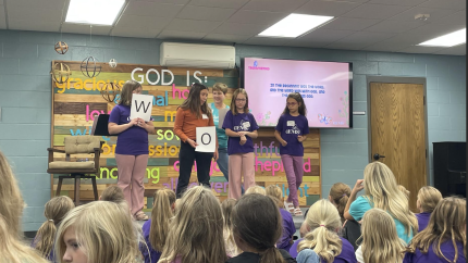 A group of girls paricipates in a ministry gathering. Courtesy of GEMS>