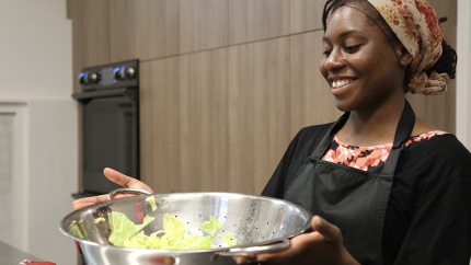 A Montreal teenager provides meals at a mission project in Montreal. Courtesy of Resonate Global Mission.