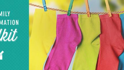 next to a picture of colorful kids' socks on a clothesline read the words "Family Faith Formation Toolkit"