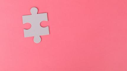 https://www.pexels.com/photo/jigsaw-puzzle-on-pink-background-3482444/