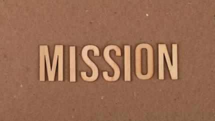 Image of the text "Mission" against a brown background. Courtesy of Pexels.