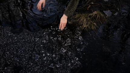 https://www.pexels.com/photo/crop-woman-picking-up-broken-glass-near-lake-in-countryside-4075305/
