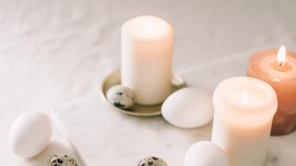 https://www.pexels.com/photo/eggs-and-lighted-candles-on-marble-top-6507035/