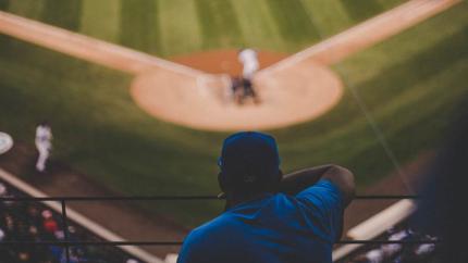 photo courtesy of pexels - https://www.pexels.com/photo/man-leaning-on-handrail-watching-baseball-game-during-daytime-147443/