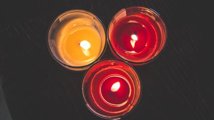 photo courtesy of pexels - https://www.pexels.com/photo/lighted-red-wax-candle-on-clear-drinking-glass-233296/