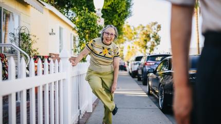 https://www.pexels.com/photo/elderly-woman-fixing-her-shoes-5637714/