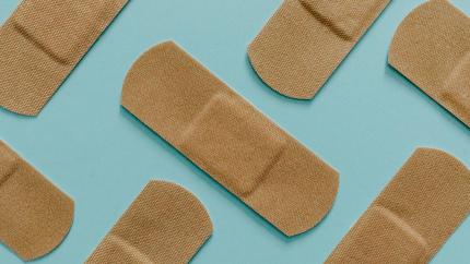 Images of band-aids against a blue background