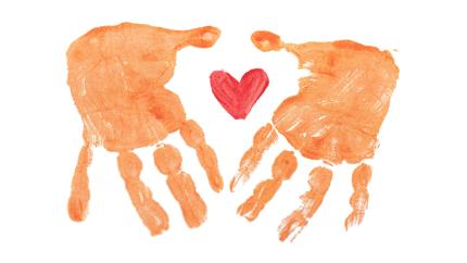 An image of hands surrounding a heart. Courtesy of Rod Long on Pixaby.