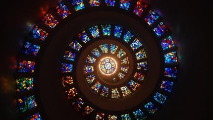 photo courtesy of pexels - https://www.pexels.com/photo/worms-eye-view-of-spiral-stained-glass-decors-through-the-roof-161154/