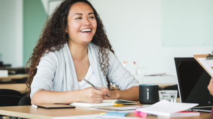 https://burst.shopify.com/photos/happy-woman-at-work?q=woman+smiling