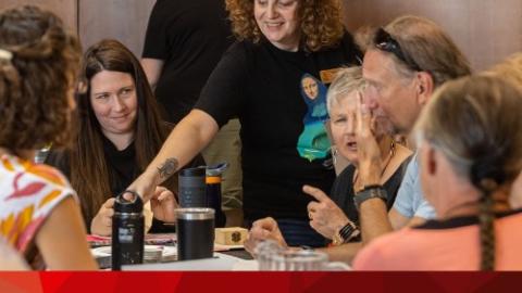 Canadian National Gathering participants from 2023 at a table
