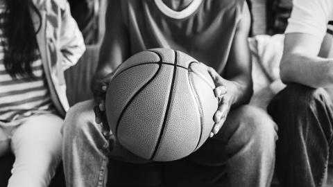 https://www.pexels.com/photo/grayscale-photography-of-person-holding-basketball-1451362/