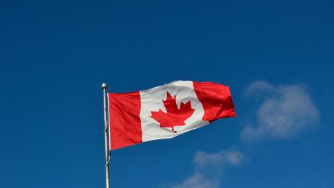 Photo courtesy of Pixabay: https://pixabay.com/en/canadian-flag-canada-maple-country-1229484/