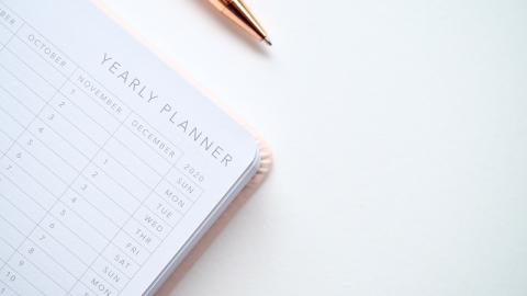 https://www.pexels.com/photo/close-up-photo-of-yearly-planner-beside-a-pen-1558691/