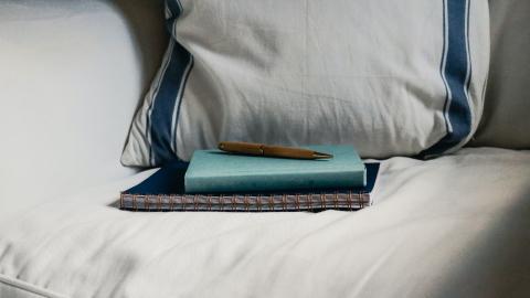 image of journal on pillow