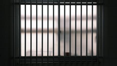 Image of a set of jail bars. Courtesy of Pexels.