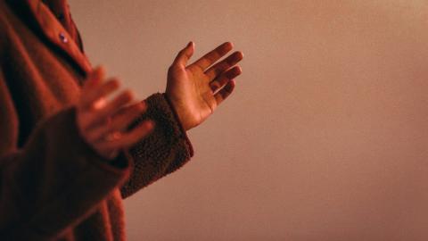 Hands open in praise