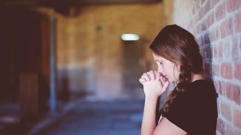 Photo courtesy of Pixabay https://pixabay.com/en/people-girl-alone-praying-wall-2597796/