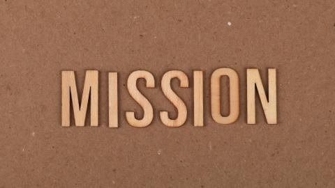 Image of the text "Mission" against a brown background. Courtesy of Pexels.