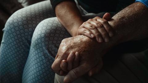https://www.pexels.com/photo/a-close-up-shot-of-people-holding-hands-8172603/