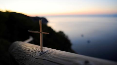 photo courtesy of pexels - https://www.pexels.com/photo/selective-focus-photo-of-brown-wooden-cross-near-body-of-water-200357/