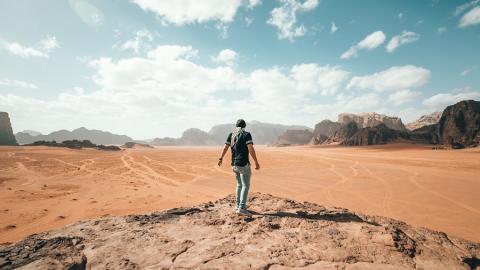 https://www.pexels.com/photo/traveler-exploring-rocky-arid-terrain-during-vacation-4388161/