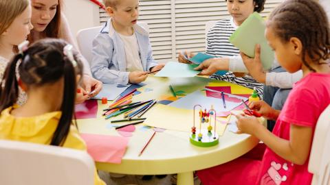 https://www.pexels.com/photo/children-sitting-on-chairs-in-front-of-table-with-art-materials-8613059/