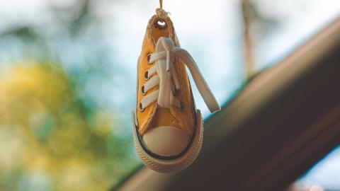 https://www.pexels.com/photo/yellow-and-white-low-top-sneaker-keychain-3358417/