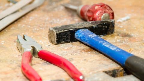 photo courtesy of pexels - https://www.pexels.com/photo/red-and-gray-pliers-beside-blue-and-black-hammer-53987/