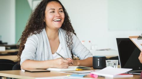 https://burst.shopify.com/photos/happy-woman-at-work?q=woman+smiling