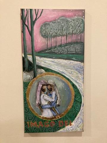Alt text for image:  dawn scene of a river with trees on each side. Layered over this vista is a circle that is a close up of brothers embracing. One brother holds a cane, reminding the viewers he walks with a limp. Becky Jones, 2023